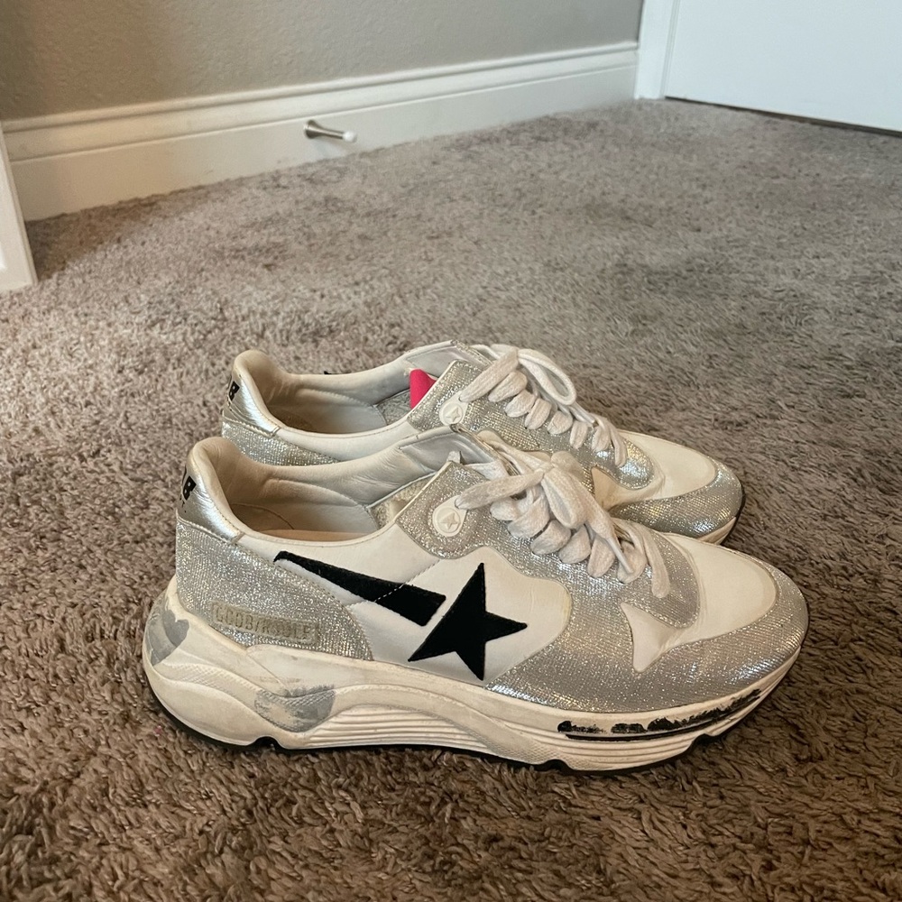White and silver Golden Goose with black star